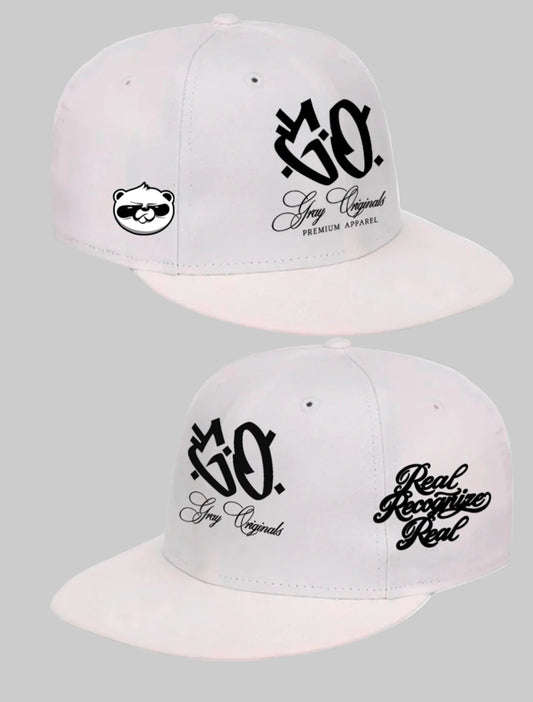 One white flat-brim snapback cap shown from different angles on a light gray background. The caps feature black embroidered logos, including '3D embroidered raised  front GO logo. In addition, embroidered flagship panda logo on the left side, right side "Real Recognize Real" embroidered on the cap.